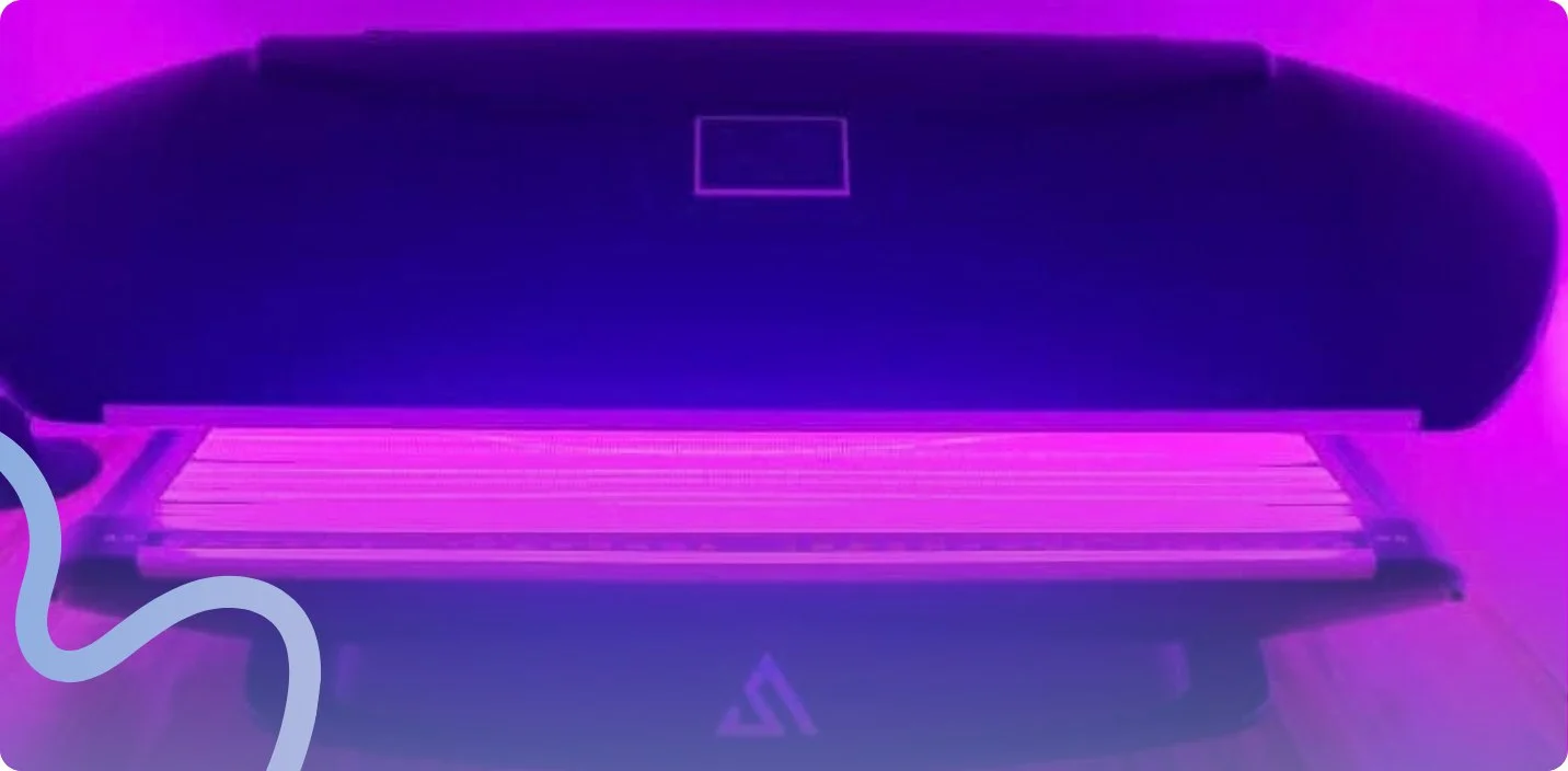 The Vita Light Therapy Bed glowing with red and blue light at ProWellness Family Chiropractic in Lincolnton, NC